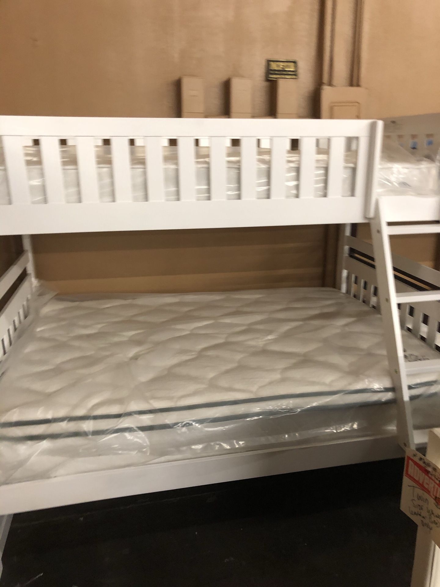 Solid wood twin over full bunk bed with mattresses and storage