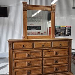 Brown Dresser with a mirror