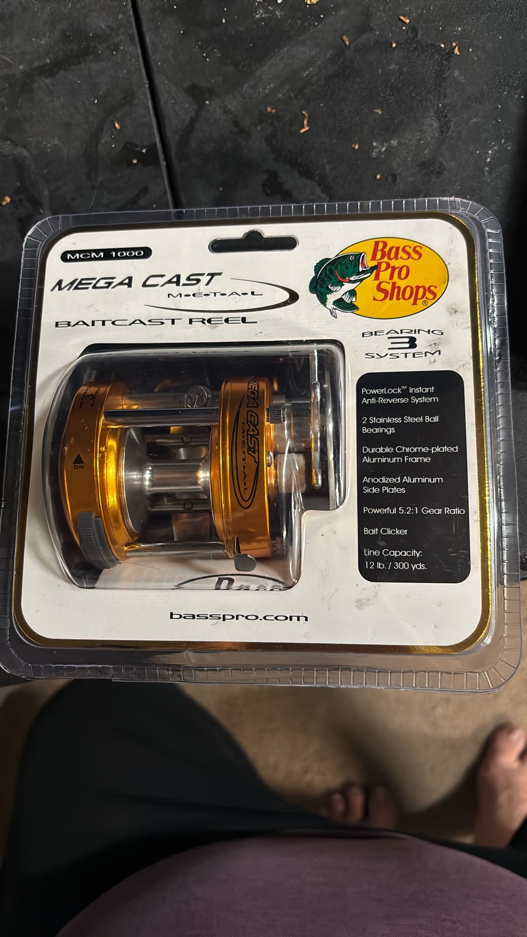Mega cast metal bait cast reel three bearing system Bass Pro shops