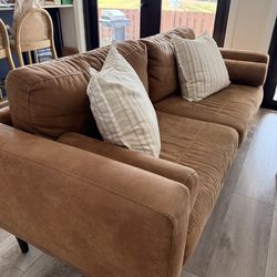 Dark tan sofa