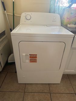 Amana washing and drying machine