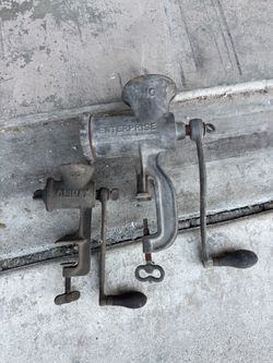 2 antique meat grinders