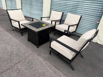 Patio,Outdoor furniture,4 Rocking chairs,cushions and Fire pit.