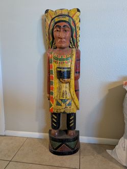 Wooden carving cigar store Indian style.