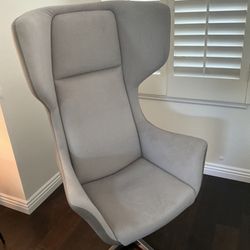 Leather Lounge chair, Orsay brand, new condition