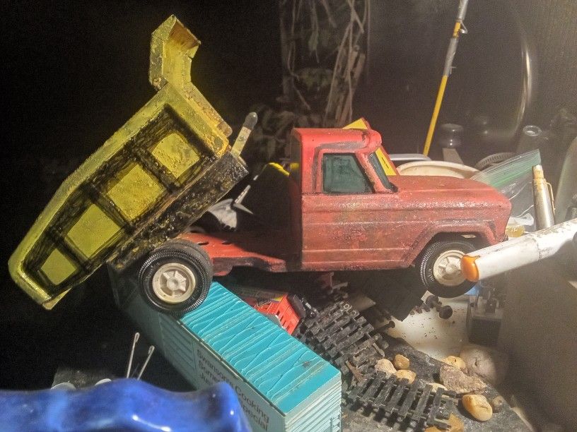 1950's Tonka Dump Bed / Dump truck And     8.     00 Scale  Vintage Lionel Train Box Cars And Tankers And A  Little Caboos That Belongs To Another Set