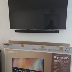 Samsung 50" Crystal UHD 4k TV With Sound Bar And Sub Woofer