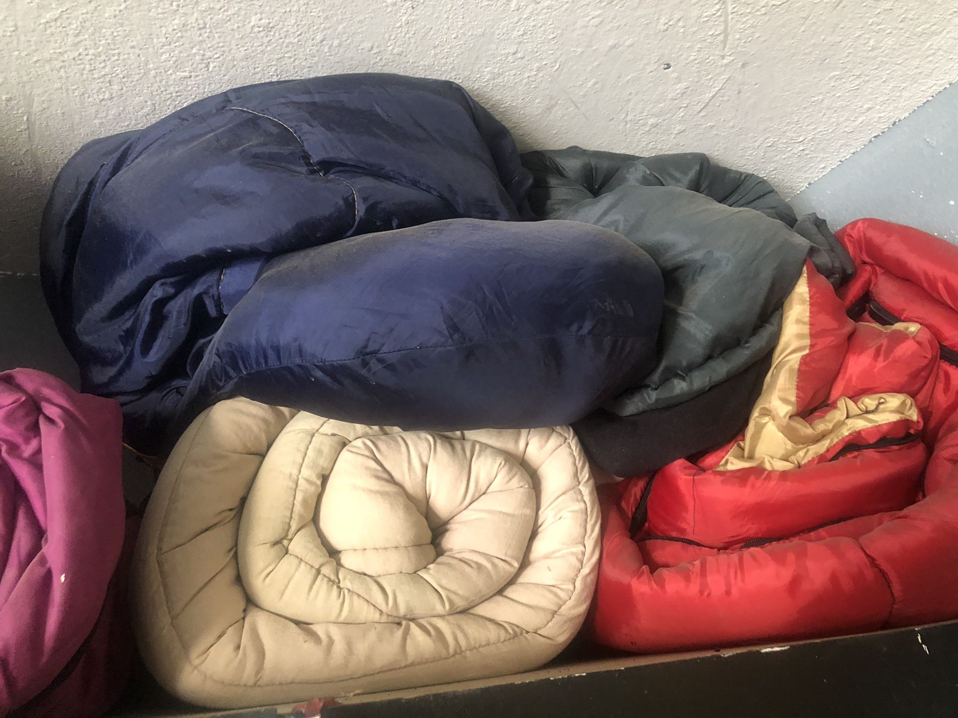 Many sleeping bags 10 each have about 10
