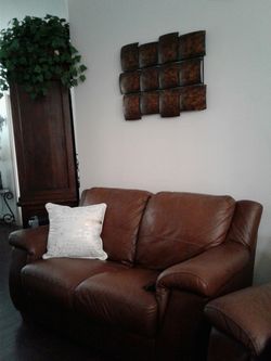 Beautiful New Luxury Leather Loveseat and Matching Recliner $450.