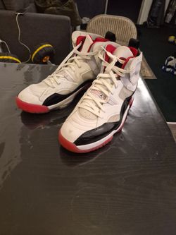 Nike Jordan Jumpman Two Trey high-top sneakers in a white, black, and gym red colorway.