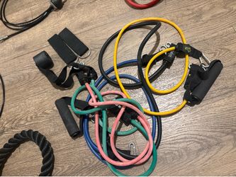 One Pulley System, One Fitness Insanity Bands New And One S. Bands Used.