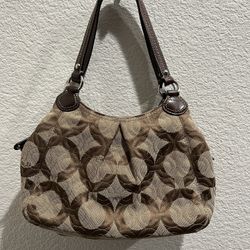 Coach Hand Bag Brown/Tan with Lilac inside lining Like new