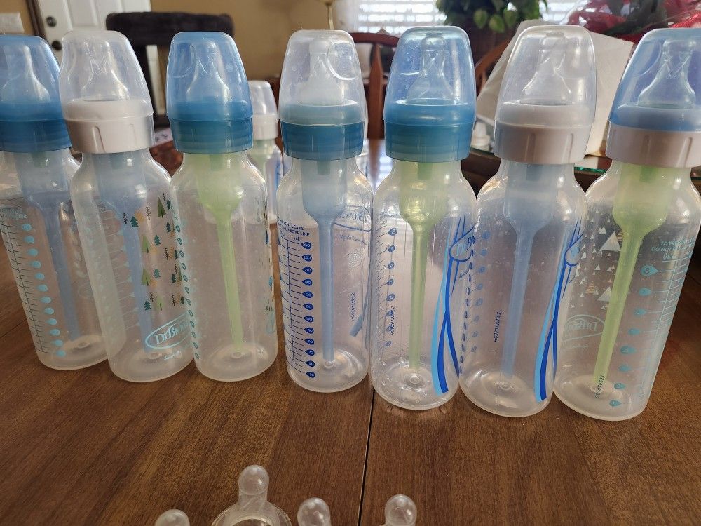 11 Dr Brown's Anti Colic Bottles With 3 Stages Of Nipples
