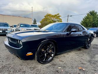 2009 Dodge Challenger R/T Coupe HEMI Power β’ Black on Black β’ Clean title β’ Leather interior & sunroof β’ New brakes β’ Flowmaster exhaust with electro