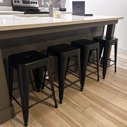 Four 24” Heavy duty metal barstools