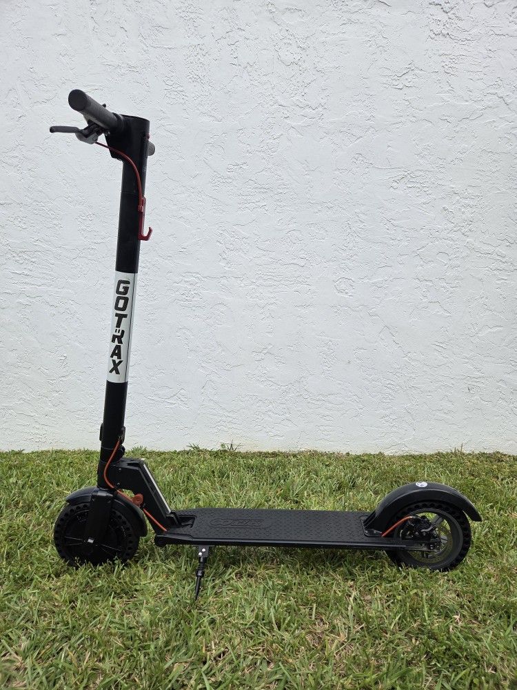 Electric Scooter, 15mph.  (Yes, It's available, send your offer!)