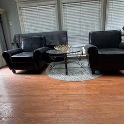 Selling 2 Black Chairs and Glass Table