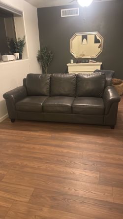 Grey couch faux leather