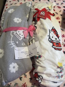 2 New hello Kitty Blankets 
