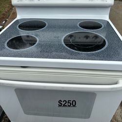 White GE  Electric Stove Ceramic Top