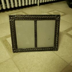 9 By 7 Picture Frame. Holds Two Photos