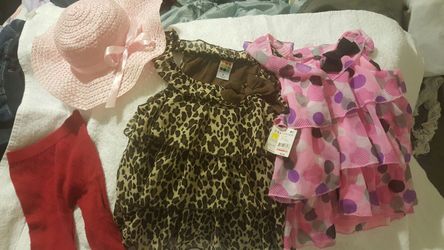 Size 3t. Includes 2 fancy shirts(1 is new with tags on), 1 red pair of tights, 1 light pink hat