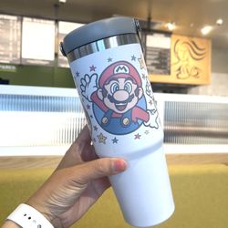 Nintendo Super Mario Bros Leakproof Tumbler 30 oz Brand New 30 Oz. IceFlow Tumbler with Leakproof flip straw. Stanley tumbler with hand carry handle.