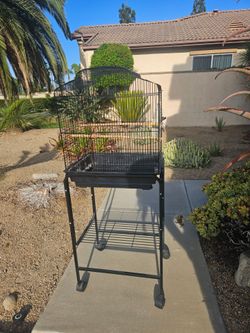 Bird cage with rolling stand