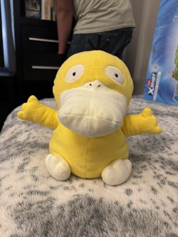 Psyduck plush toy.