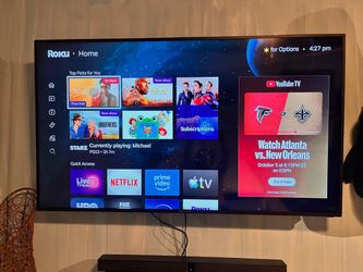 65’ tv mint conditons with remote and wall rack