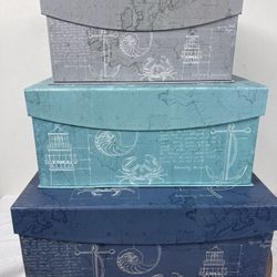 Set Of Three Decorative Storage Boxes.