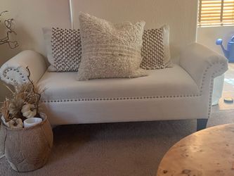Cream Upholstered Loveseat with Nailhead Trim