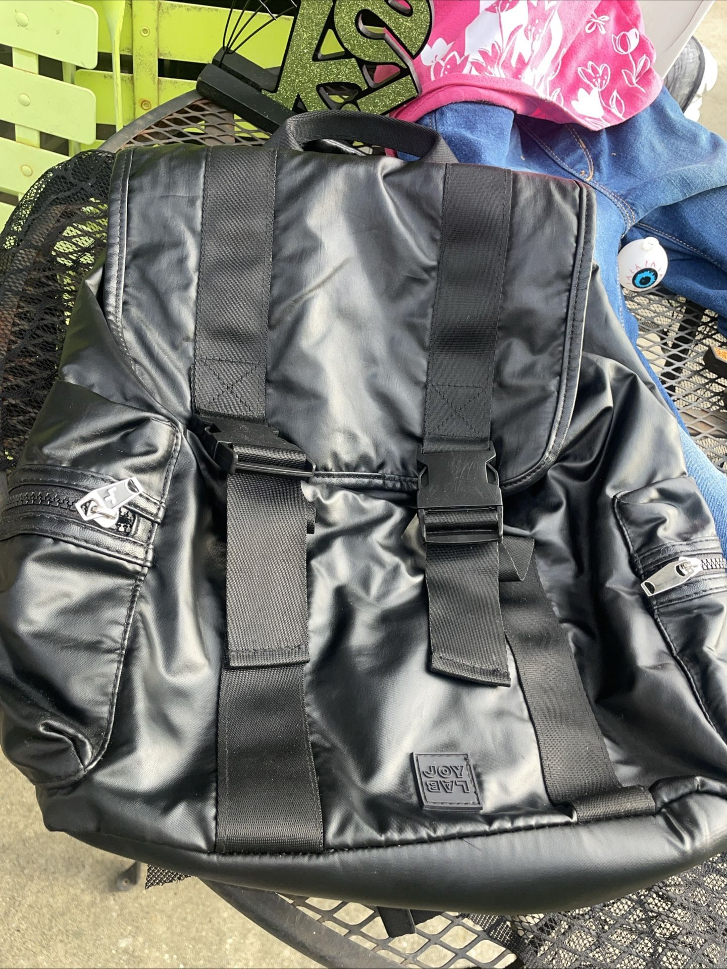 JoyLab Black Minimalist Backpack with Glossy Finish and Adjustable Straps