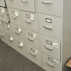 Metal File Cabinets (5 Of Them W/4 Drawers Each)