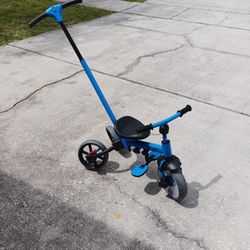 Kids Tricycle With Training Pole Like. New. Very. Good. To. Take. The. Kids For. A. Ride. And. Teaching. How. To. Ride