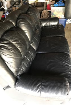 Leather Couch with recliners on both sides