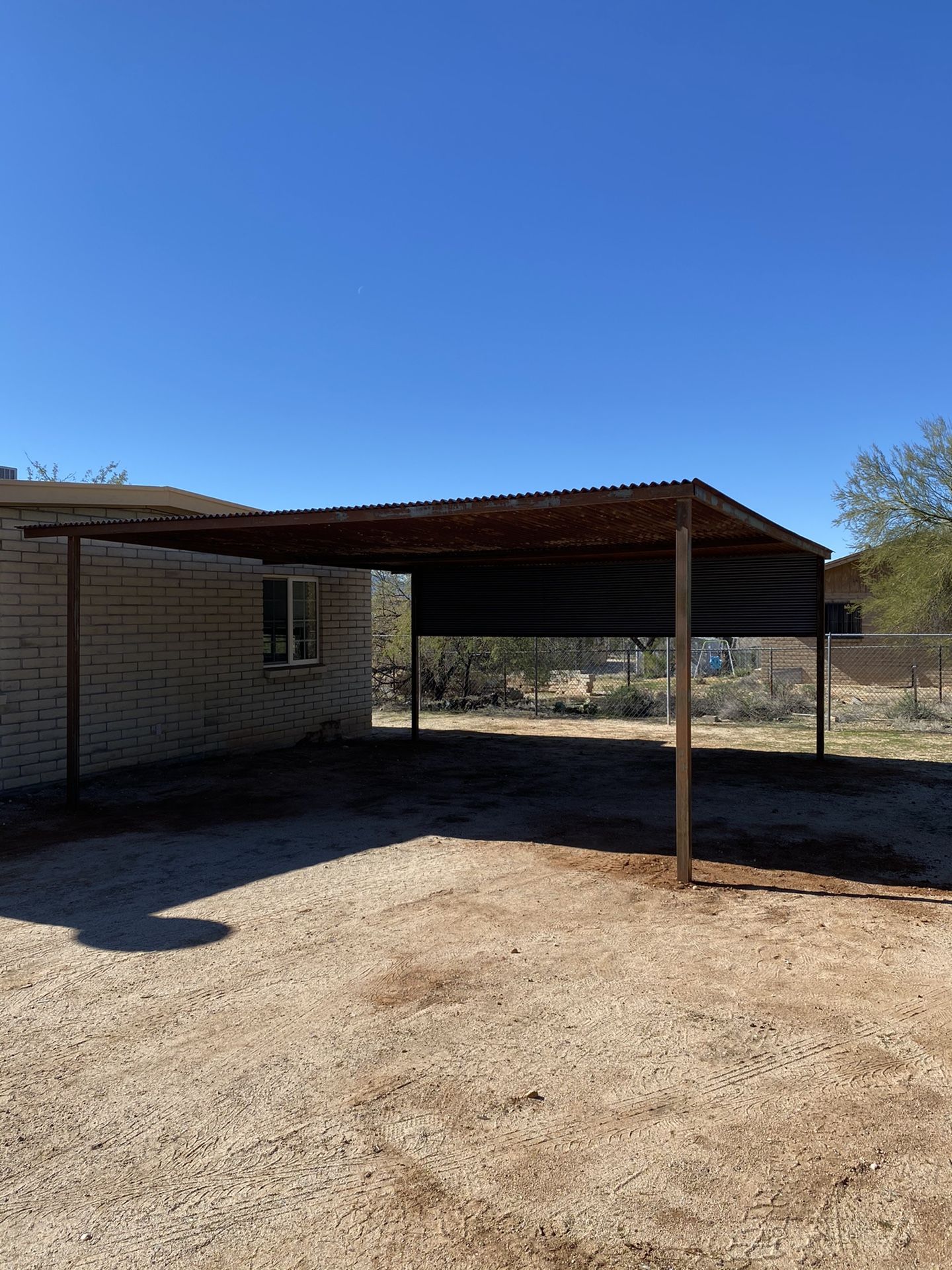 Rustic Shade structures/corrugated fence/Awnings