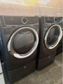 Electrolux front load washer and gas dryer set