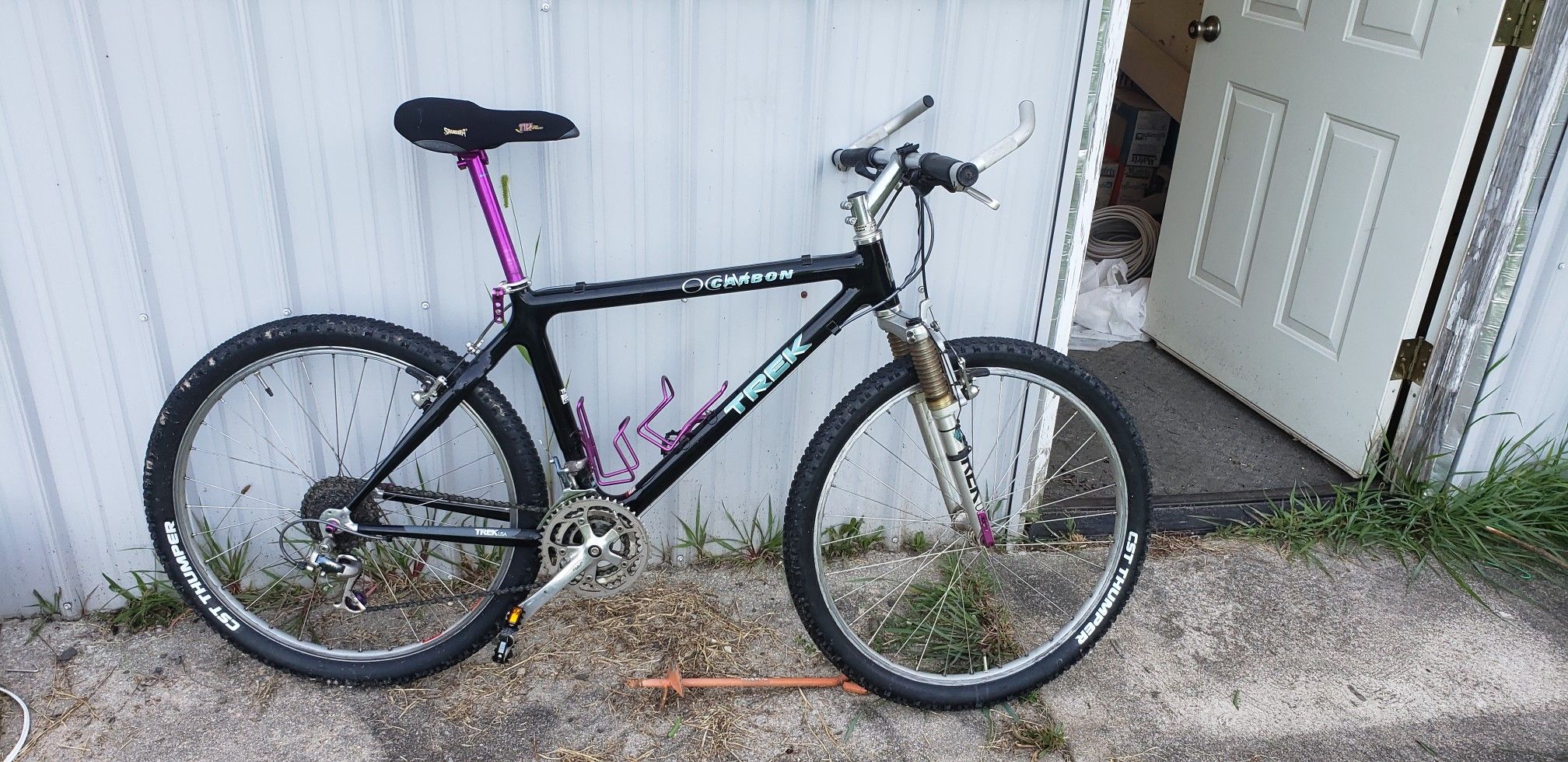 Trek carbon fiber mountain bike with spare matrix rims.