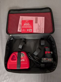 New Milwaukee M12 4ah Battery, Charger, and Case