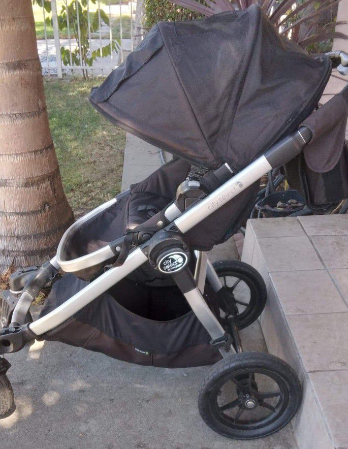 Baby Jogger City Select 2015 Runs Perfect It Works As A Double Stroller Comes With The Adaptors It Has 16 Configurations From Birth To 45 Pounds  $140