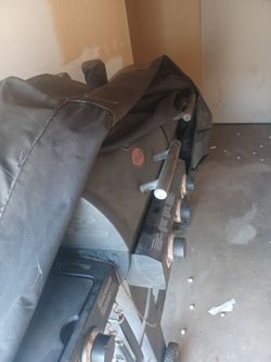 Propane and charcoal grill with side burner