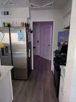 Samsung refrigerator and freezer side by side with ice and water dispenser in door