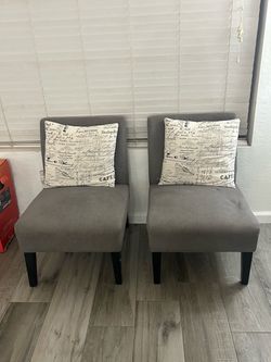 Two grey chairs