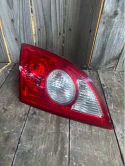 04-08 CROSSFIRE DRIVER LEFT QUARTER PANEL MOUNTED BRAKE STOP TAIL LIGHT LAMP