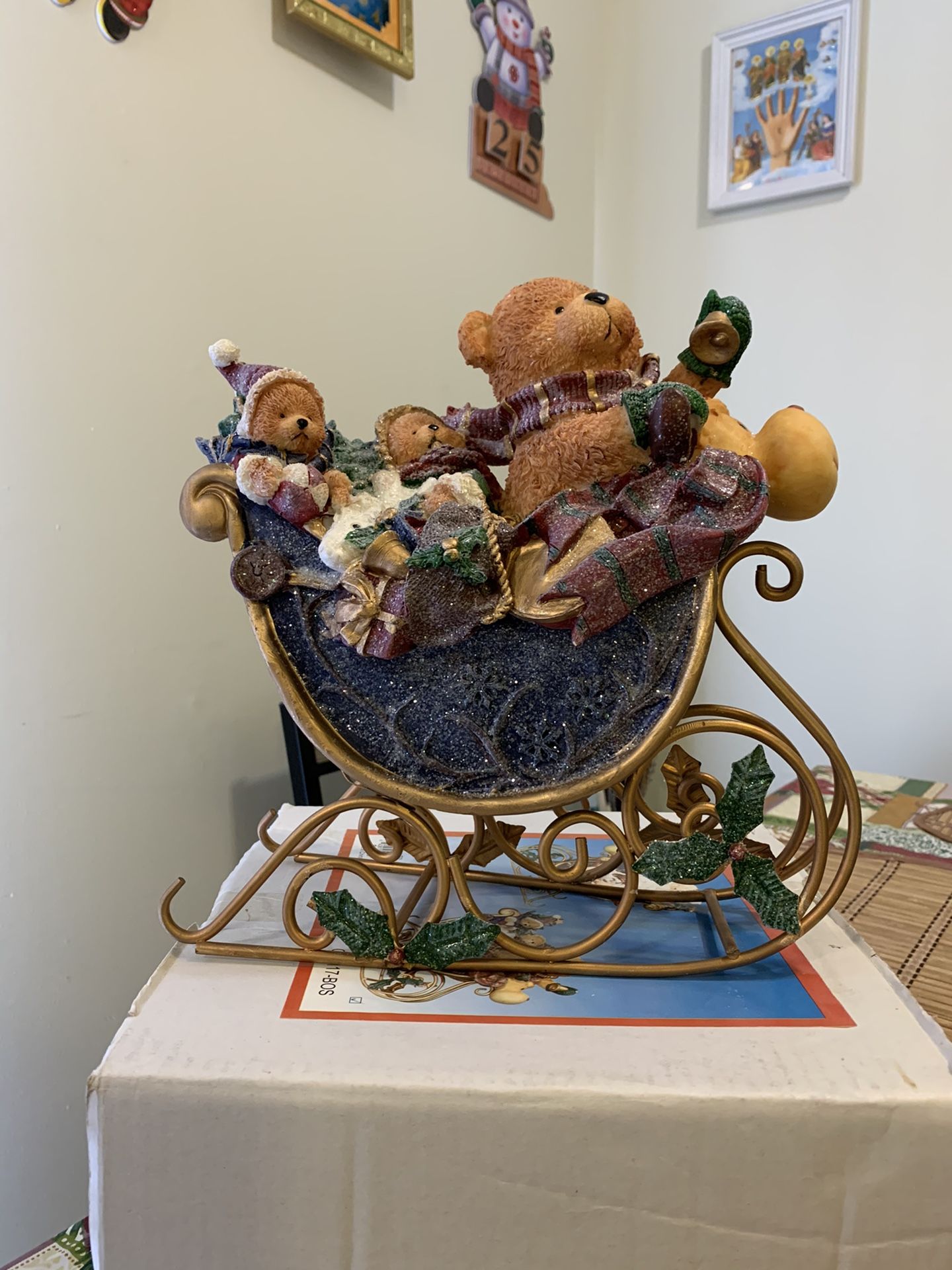Family of bears in a Christmas sleigh