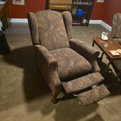 2 Comfortable paisley-patterned recliner chairs
