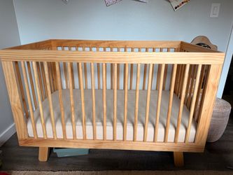 Convertible crib / toddler bed