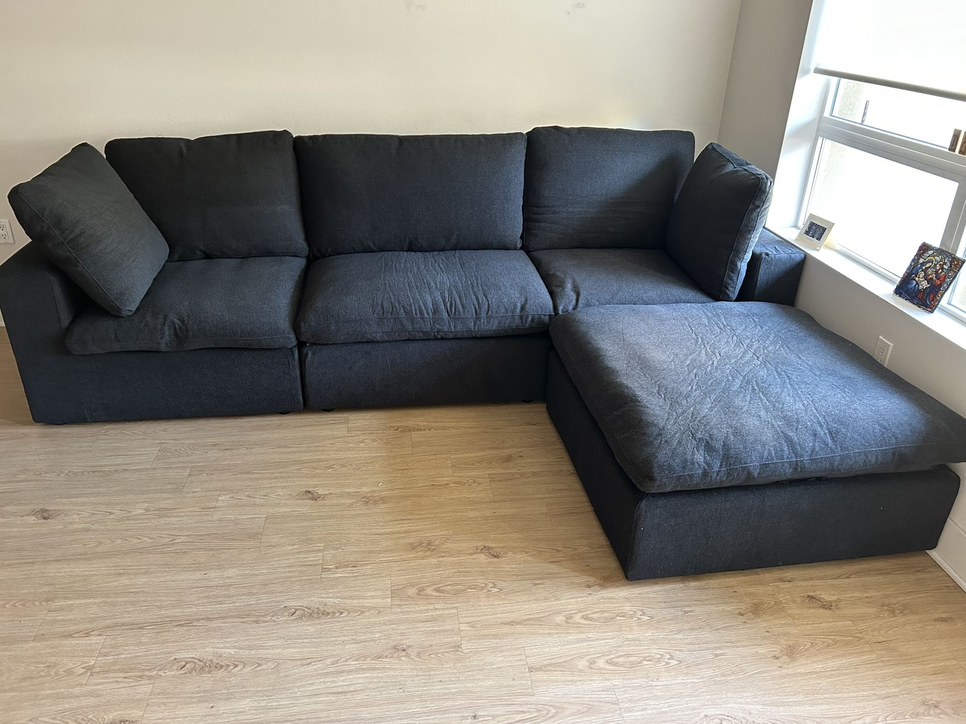 NEED GONE black Sectional