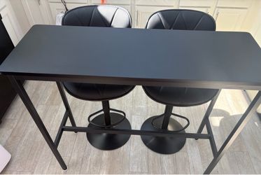 All black bar table and 2 bar chairs